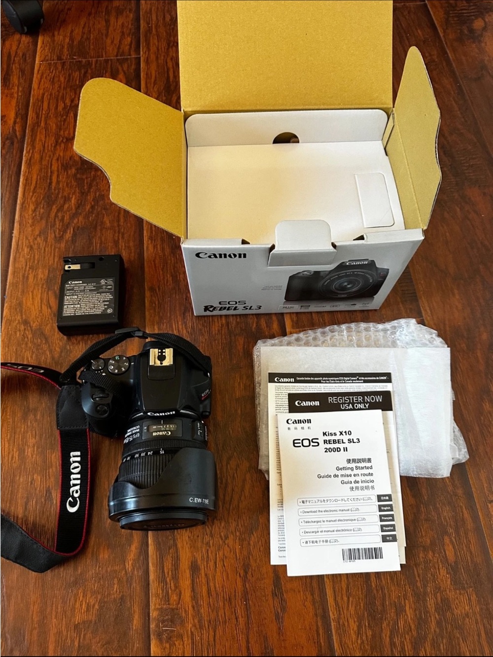 Canon EOS Rebel SL3 DSLR Camera - Black with 15-85 lens